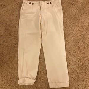 Cute whitish cream pants. Love the buttons!